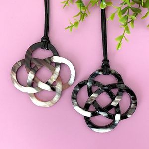 Pendentif en corne de buffle du Vietnam, écologique, moderne, fait main avec un design à trous, collier - Product Image 6
