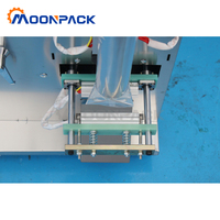 Machine d'Emballage Verticale Moonpack MP-VFFS-G-100g pour Granulés, Multi-fonctions, Pesage et Remplissage de Sacs Plastiques pour Noix de Cajou