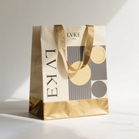 Sac en papier d'aluminium de platine avec poignée en ruban d'or haut de gamme personnalisé sac de shopping d'emballage de bijoux pour femmes