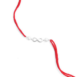 Rakhi Infinito Plateado con Roli Chawal, Joyería Tradicional y Cultural Coleccionable para Hermanos - Product Image 1