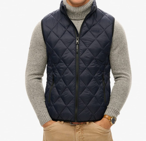 เสื้อกั๊กผู้ชายแบบสั่งทำ เสื้อกั๊กฤดูหนาวแบบไม่มีแขน เสื้อกั๊กบุใยสังเคราะห์สำหรับกิจกรรมกลางแจ้ง อุ่น น้ำหนักเบา สวมใส่สบาย เหมาะสำหรับทำงาน แฟชั่นแบบเย็บติดกัน - Product Image 1