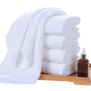 Vente en gros de haute qualité blanc 100% coton hôtel serviette de bain éponge Super doux séchage rapide hôtel serviette de bain en microfibre fabricant