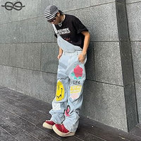Salopette baggy en denim déchiré pour hommes, visage souriant mignon, conception en détresse, combinaison en jean détruit avec poches fonctionnelles
