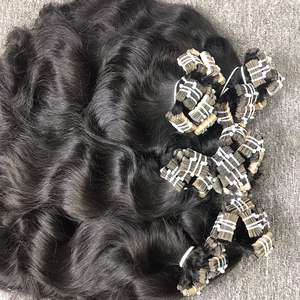 Meilleure vente 100% extensions de cheveux crus vietnamiens en gros Machine à ruban adhésif de style ondulé naturel Double trame Meilleure vente - Product Image 3