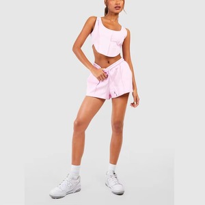 Vente en gros d'ensembles d'été pour femmes 2025 ensemble de shorts de sport 2 pièces pour femmes ensemble de débardeurs et de shorts de motard personnalisés 2 pièces - Product Image 1