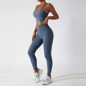 Conjunto de Yoga Activewear para mujer de alta calidad, pantalones de Fitness para gimnasio de 2 piezas con Bolsillos y Sujetador deportivo, diseño de hombros inclinados - Product Image 4