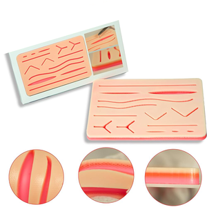 Instrument de pratique de suture de peau traumatique OEM Tampon de suture en silicone à 3 couches pour la formation médicale enseignant le modèle de peau humaine - Product Image 6