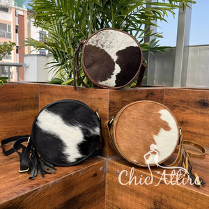 Bolso de cantimplora de cuero para ocultar el cabello inspirado en el oeste de moda Eslinga circular de cuero genuino con acento de borla y cierre de cremallera - Product Image 1