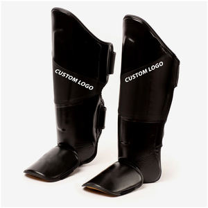 Protège-tibias de boxe personnalisés MMA Muay Thai pour l'entraînement et le sparring, en cuir, fermeture à boucle et crochet, absorption des chocs, équipement de protection - Product Image 1