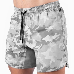 กางเกงขาสั้น2 in 1สำหรับผู้ชายกางเกงกีฬาขาสั้นผ้าโพลีเอสเตอร์แห้งเร็วแบบ100% - Product Image 1