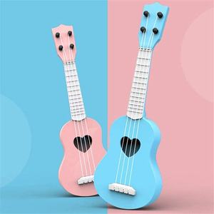 Ukelele de plástico de juguete de música clásica Unisex de alta calidad adecuado para niños pequeños al por mayor hecho en Vietnam Mini guitarra de juguete - Product Image 5