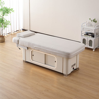 Lit de soin électrique moderne avec dossier et repose-jambes réglables pour salon de beauté, spa, clinique, fabricant