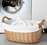 Panier en rotin naturel avec doublure en coton amovible et poignées tressées, parfait pour les buanderies et le rangement à domicile en provenance du Vietnam