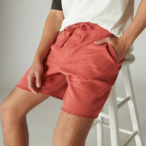 Wholesale 100% Cotton short solid <b>colour</b> custom DTF Logo printed with side pockets & raw hem streatwear Shorts for Men's - Product Image 6