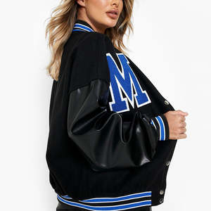 Veste universitaire pour femme de haute qualité, sur mesure, avec patch brodé Chanelle, manches en cuir et corps en laine 100% - Product Image 2