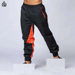 ชุดวอร์มเสื้อกันลมสำหรับผู้ชายกางเกงคาร์โก้ไนลอนแบบมีซิปน้ำหนักเบาชุดวอร์มกันลมออกแบบได้ตามต้องการ - Product Image 5