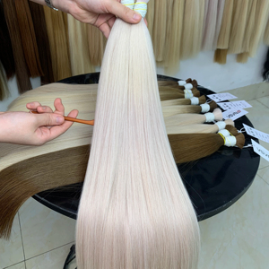 ผมต่อแบบชาวเวียดนาม100ก. สีอ่อน65ซม. ผมคนแท้มัดผมยาวสองชั้น - Product Image 1