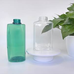 थोक 550/650 मिली चाय और स्पष्ट वर्ग पालतू जानवरों की बोतलें बड़ी क्षमता कस्टम लोगो परिवार और वाणिज्यिक त्वचा देखभाल कंटेनर - Product Image 1