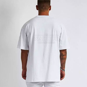 Doté d'un t-shirt gaufré minimaliste et confortable T-shirt en relief à col rond doux fabriqué au Pakistan - Product Image 2