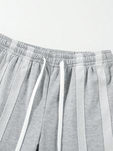 กางเกงวอร์มทรงบานสำหรับผู้ชายกางเกงเอวยางยืดขายาวมีเชือกรูดด้านล่างพิมพ์ลาย - Product Image 5