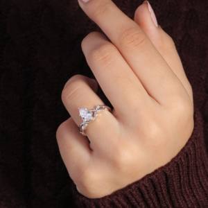 Custom 18K Gold and <b>Copper</b> Pear Cut Lab Grown Diamond Ring Fashionable Religious Engagement Jewelry - Product Image 1