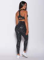 Leggings léopard noir brillant avec logo personnalisé en gros finition brillante taille haute nouveauté et vêtements de sport leggings de gymnastique à la mode pour les femmes
