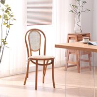 Chaise de salle à manger pivotante Sonett en bois massif avec dossier en rotin, style nordique, usage commercial, intérieur