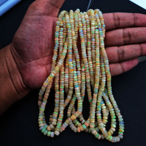 เม็ดโอปอลไฟเอทีโอเปีย17นิ้ว4-6มม. พลอยเจียระไนเหลี่ยมสีขาวเรียบขนาด8มม. อัญมณีหลวมให้ความร้อน55กก. - Product Image 4