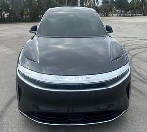 Auto 2024 Air Touring Coupe Turbo AWD, Bajo Kilometraje, Caja de Cambios Automática, Asientos de Cuero, Volante a la Izquierda, Color Oscuro, Funcionamiento a Gasolina - Product Image 1