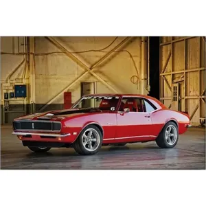Impression sur toile Fida Red Racing Camaro dans un hangar en bois - Product Image 6