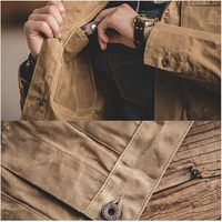Veste rétro en toile de cire à l'huile kaki pour hommes avec de grandes poches perlées Manteau vintage 100% coton-Service OEM Produit fini