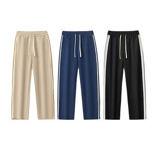 กางเกงวอร์มคุณภาพสูง กระเป๋าเยอะ ผ้าฝ้าย 100% กางเกงแทร็คแพนท์ทรงหลวมสำหรับผู้ชาย - Product Image 1