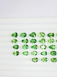 พลอย tavorite ธรรมชาติ55ชิ้นความเงางามสูงสีเขียวสดใส IGI - Product Image 2