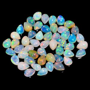 Cabochon de poire en opale éthiopienne 7x5mm pierre précieuse naturelle en vrac cabine d'opale de feu polie lisse vente en gros fabrication de bijoux en opale éthiopienne - Product Image 4