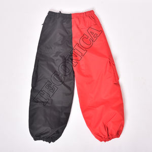 Pantalones de esquí impermeables rojos y negros de dos colores para exteriores Pantalones de snowboard con bucles para cinturón Bolsillos con cremallera y cintura con cordón - Product Image 2