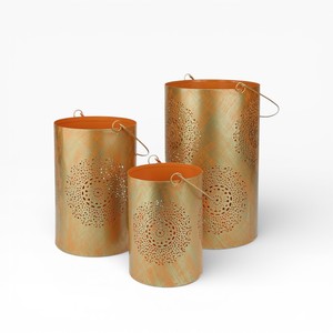Set Of Three Gold Finish Metal Votives Candle Holders With Hanging Handle And Floral Cutwork Pattern - Product Image 1