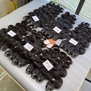 Venta al por mayor 100% Extensiones de cabello virgen vietnamita 12A Paquetes de doble dibujado Un donante Cuerpo Onda Cabello Crudo Sin procesar - Product Image 3