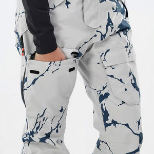 Baberos de esquí para mujer hechos a medida, pantalones de nieve aislados transpirables impermeables con impresión de logotipo para deportes de invierno y esquí - Product Image 2
