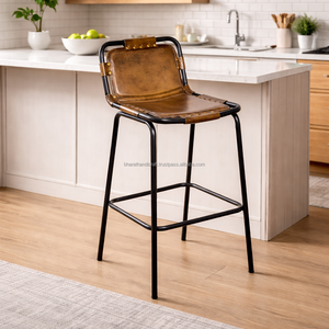 Chaise de bar minimaliste avec structure en métal, lignes élégantes et assise confortable pour îlot de cuisine moderne et comptoir. - Product Image 1