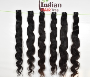 Paquet de Cheveux Humains Indiens Bruts Ondulés Extension Naturelle Produit Pas Cher Meilleure Qualité Vendeur Vierge Remy Non Transformé par l'Exportation à vendre - Product Image 1