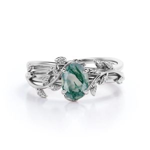 Anillo de Compromiso Personalizado con Grabado de Hoja y Enredadera, con Ágata de Musgo Ovalada de 1 Quilate y Moissanita en Oro Blanco - Product Image 1