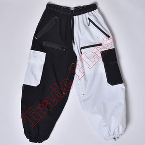 Premium Two-<b>Tone</b> Ski Pants in Black and White Featuring Waterproof Shell Utility Pockets and Adjustable <b>Belt</b> - Product Image 1