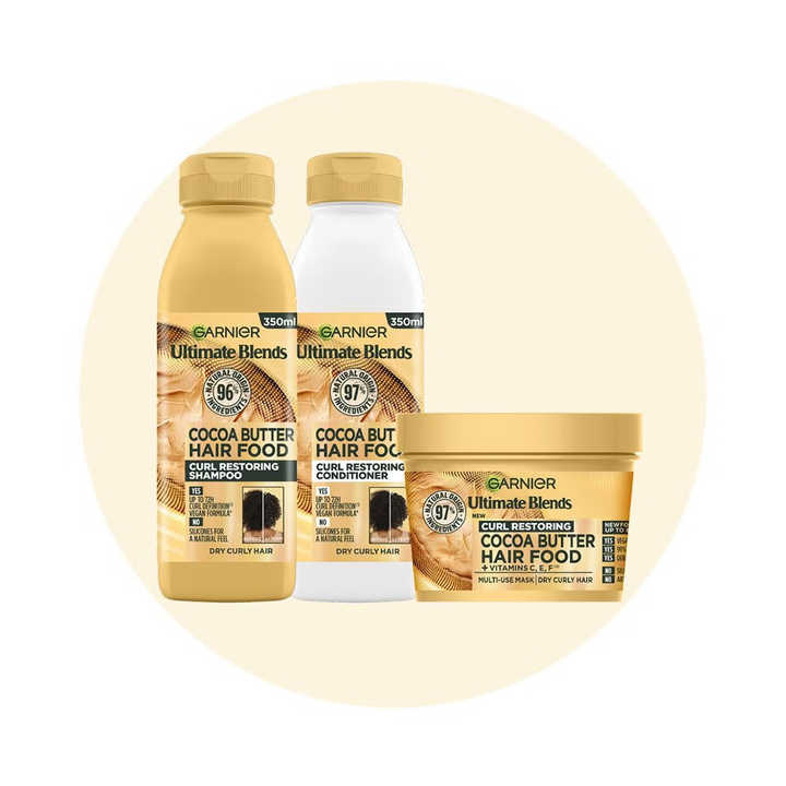 Cleanse and define your curls with Garnier Ultimate Blends Hair Food 350ml Shampoo Cocoa Butter formula