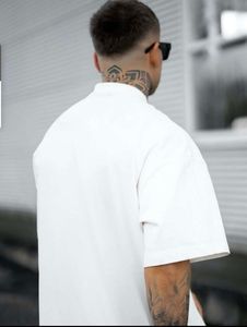 T-shirt graphique imprimé surdimensionné unisexe de haute qualité T-shirts pour hommes en coton avec impression bouffante Motif de logo vierge - Product Image 6