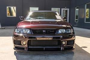 Nissan Skyline GT-R NISMO S1 de 1996, occasion, boîte manuelle 5 vitesses, couleur violet nuit, modifications importantes, provenance américaine. Titre - Product Image 1