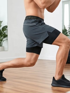 Shorts de sport pour homme de haute qualité à séchage rapide avec poches, taille élastique, longueur mi-cuisse, gris uni, en polyester, pour la course et l'entraînement - Product Image 3