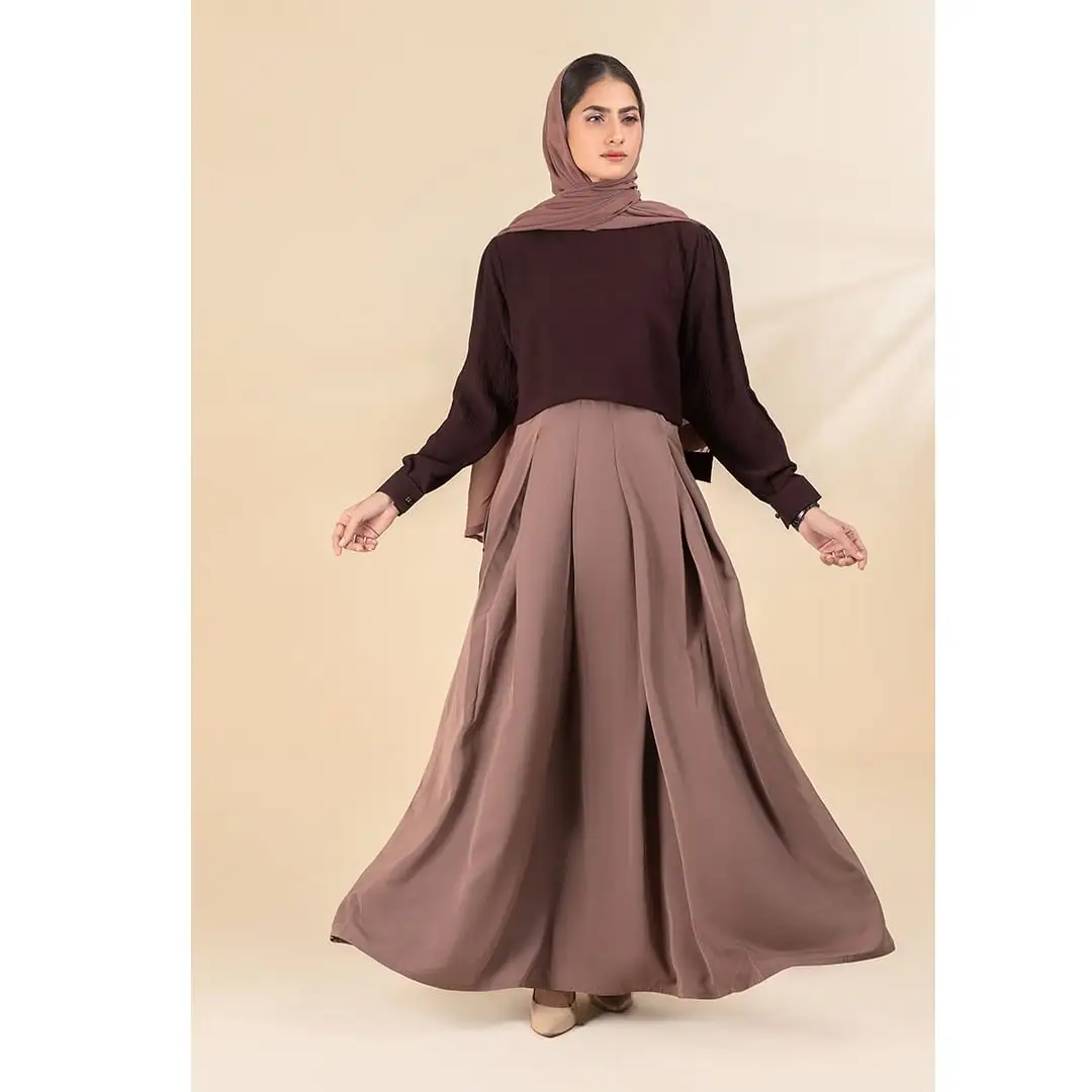 2pcs the maxi Abaya steals the spotlight crafted with love from a blend of CEY and saudi nidah fabric