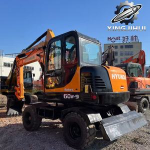 Excavatrice Hyundai 60W-9 d'occasion, 6 tonnes, marque coréenne d'origine, petite, moyenne, sur roues, provenance Corée, moteur Yanmar. - Product Image 4