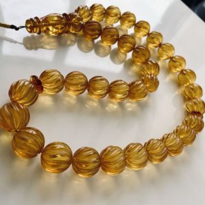 ลูกประคำอำพันบอลติกสีเหลืองอ่อน แกะสลักด้วยมือจากอำพันธรรมชาติ เม็ดกลม - Product Image 6