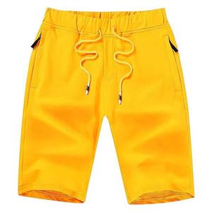 กางเกงขาสั้นผ้าฝ้ายผู้ชายเอวยางยืดสีเหลืองแห้งเร็วระบายอากาศได้ดีมีกระเป๋าสำหรับใส่วิ่ง - Product Image 6